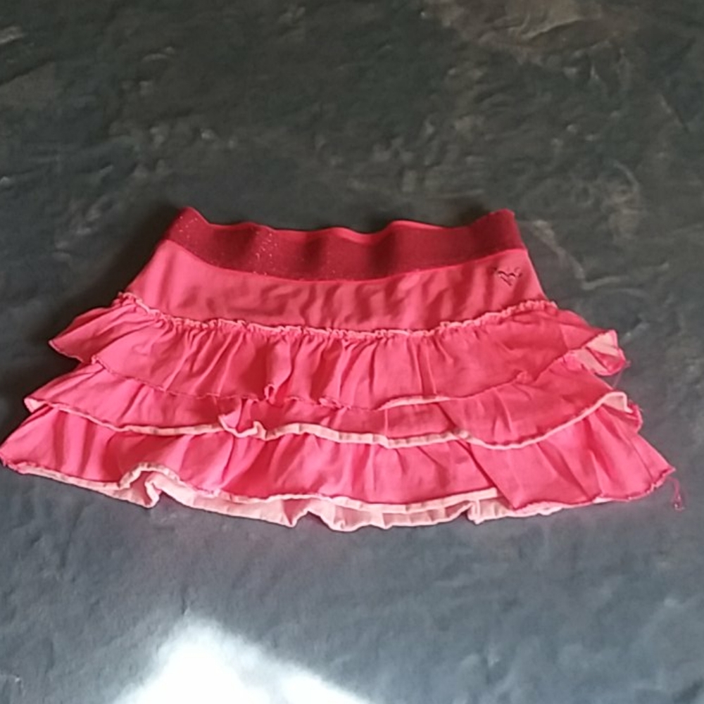 Girls pink skirt with shorts under like new